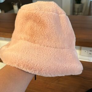 Bucket hat with adjustable strap inside